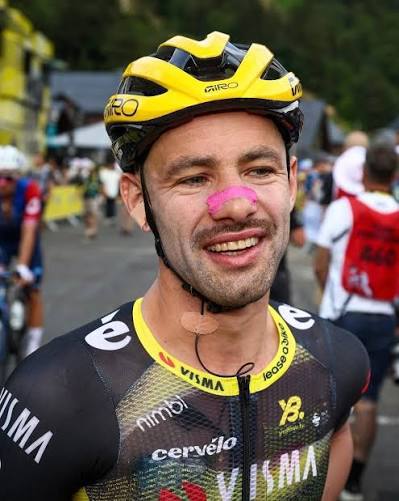 Cyclist in the peloton wearing pink HiStrips nasal strips